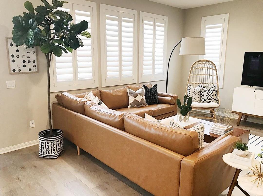 Cozy living room with Polywood shutters in Austin.